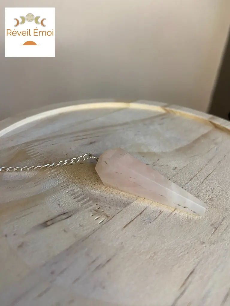 pendule quartz rose cônique.webp